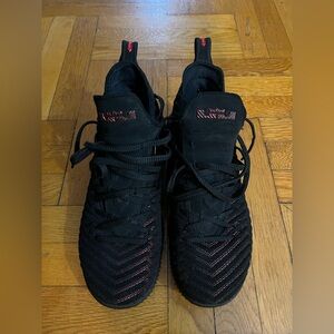 Sleek Black and Red High-Top Sneakers